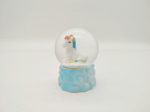 Glitterball Unicorn looking to the left